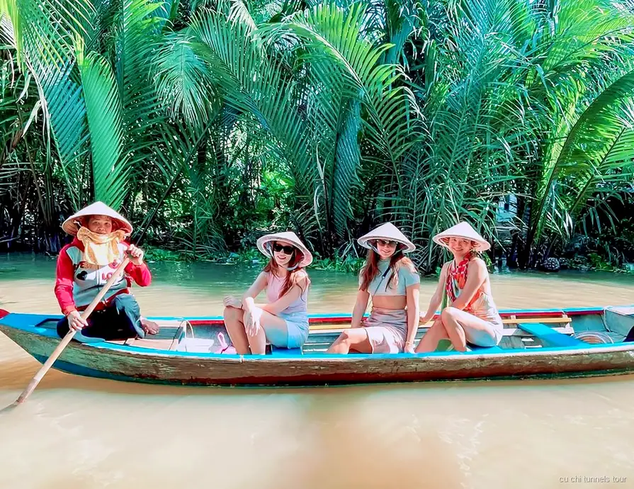 Sampan boat ride through Mekong Delta canals on the Cu Chi Tunnels and Mekong Delta tour